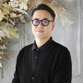 上根　康弘