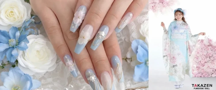 ブルーとホワイトのグラデーションに薔薇アートとゴールドラインを施した上品なロングネイルデザイン