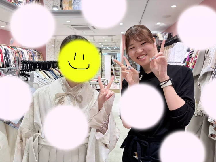 TAKAZEN姫路店のピンク色×白色のくすみカラーのリボン袴コーデのお嬢様